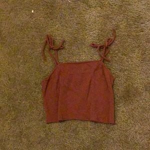 Cute reddish maroonish tank top with tie straps